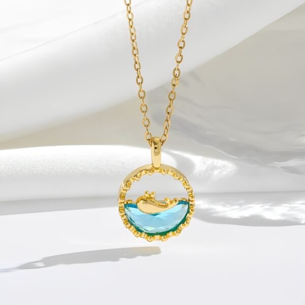 Pendant chain and clasp details in gold finish