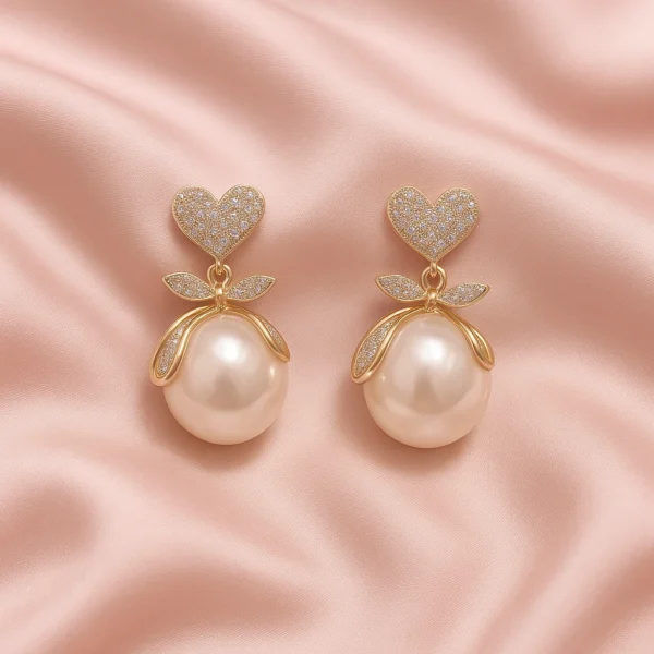 Close-up of faux pearl wrapped in gold petals