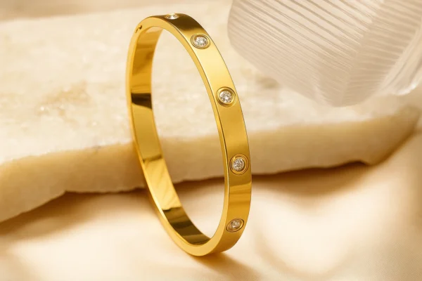 Sleek gold screw bracelet – luxury jewelry side view