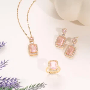 gold-plated amethyst purple stone jewelry set with earrings, pendant necklace, and ring.