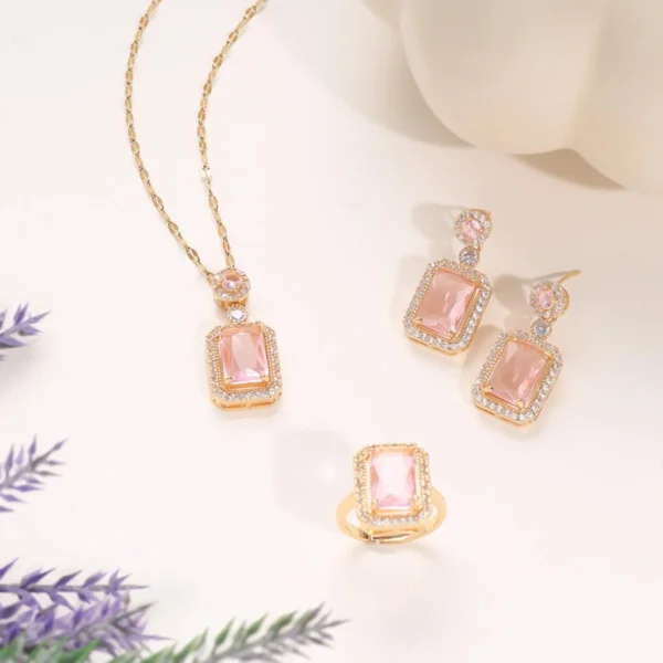 gold-plated amethyst purple stone jewelry set with earrings, pendant necklace, and ring.
