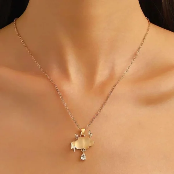 Gold chain necklace with a matte cloud pendant, gold lightning bolts, and a crystal raindrop charm.