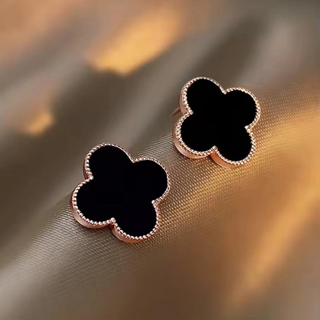 Elegant black clover stud earrings with gold trim – minimal daily wear jewelry for women