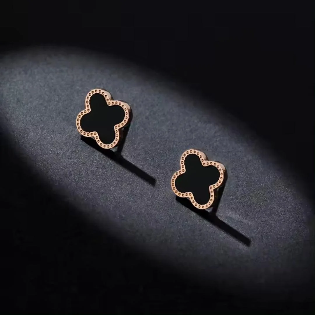 Elegant black clover stud earrings with gold trim – minimal daily wear jewelry for women
