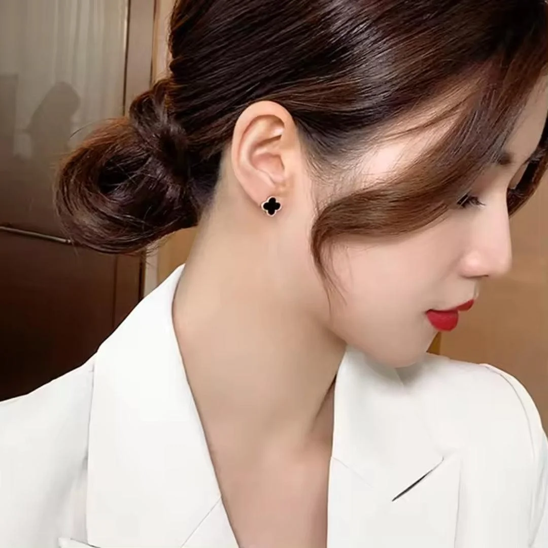 Elegant black clover stud earrings with gold trim – minimal daily wear jewelry for women