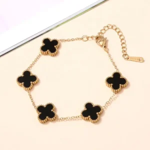 Gold-plated bracelet with black clover charms – trendy daily wear jewelry for women