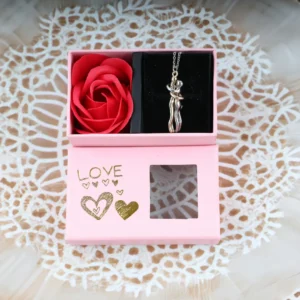 Pink “LOVE” gift box with couple-hug pendant necklace and one artificial red rose, gold heart print and display window.