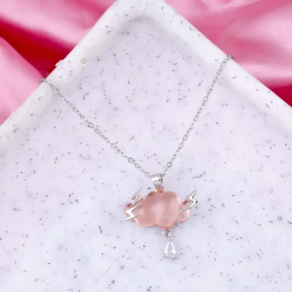 Silver-plated pink cloud pendant necklace with lightning bolts and crystal drop charm.