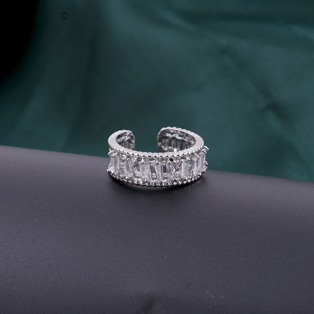 Adjustable silver ring with baguette-cut zircon stones, elegant minimal design for women.