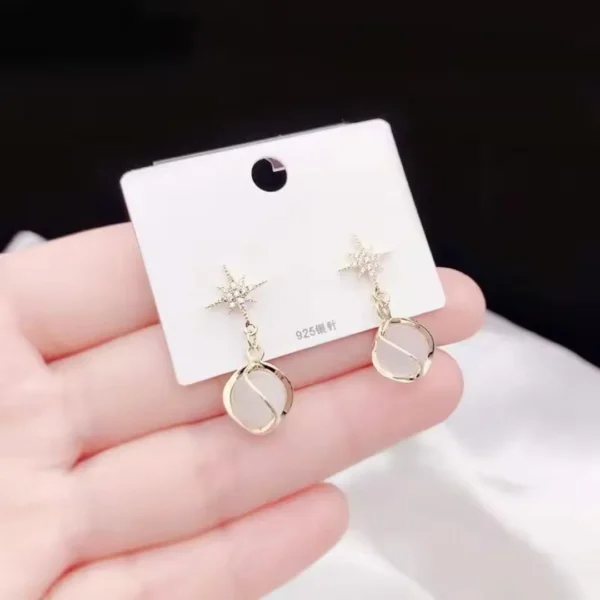 Dainty gold earrings with star studs and opal drop charm – celestial-inspired jewelry for girls