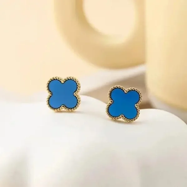 Anti-tarnish blue clover-shaped stud earrings for girls, minimal daily wear jewelry with gold border.