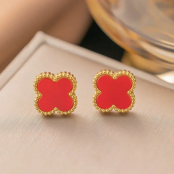 Anti-tarnish red clover-shaped stud earrings with gold border – simple daily wear jewelry for girls.