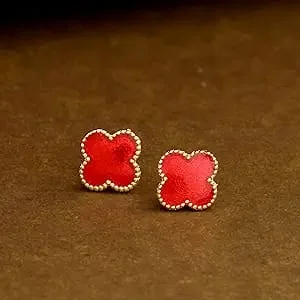 Anti-tarnish red clover-shaped stud earrings with gold border – simple daily wear jewelry for girls.