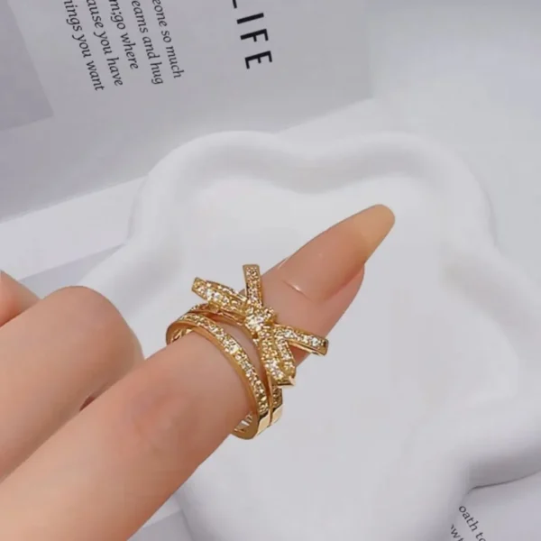 Gold bow ring with sparkling stones, adjustable party wear ring for women and girls