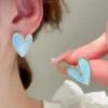 Gold-lined blue heart stud earrings for girls, pastel enamel daily wear studs