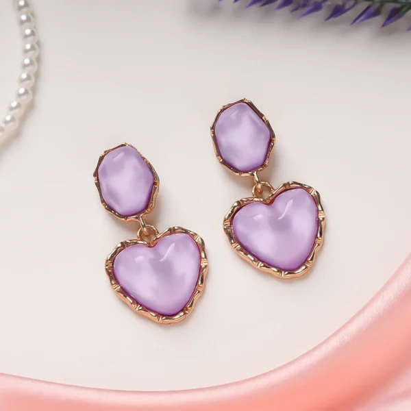 Gold plated lavender heart earrings with glossy enamel shine