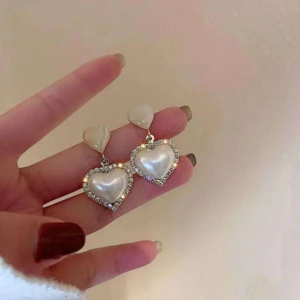 White pearl heart earrings with crystal border, shiny party wear drop earrings for women